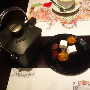 Pot of mint tea with petits fours