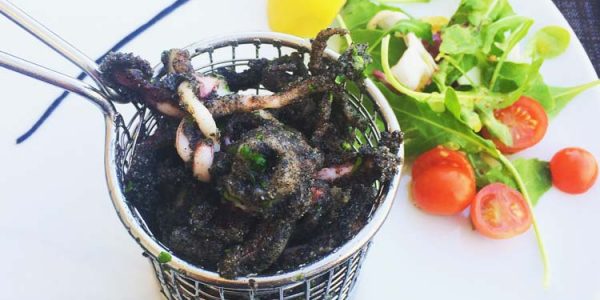 Black fried calamari tossed in himalayan salt garlic and parsley
