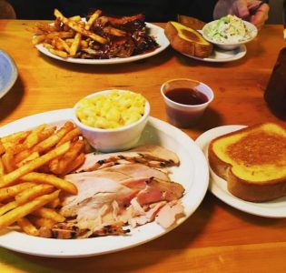 Turkey with bbq sauce, fries, mac n’ cheese, beef brisket, pulled pork, baby back ribs, coleslaw, garlic bread