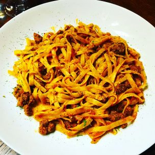 Wild game bolognaise over fettucine