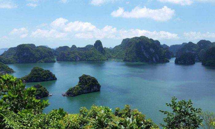 Exploring Halong Bay in a Luxury Junk, Vietnam – WhodoIdo: Floating on emerald waters, cruising past thousands of limestone islands in Halong Bay in a Junk.