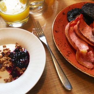 Yogurt and granola with a full English breakfast